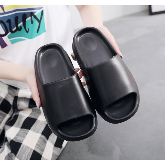 Thick-soled, poop-feel-like, EVA slippers for men and women, coconut sandals with the same Yeezy and Kanye West style. Thick-soled, poop-feel-like, EVA slippers for men and women, coconut sandals with the same Yeezy and Kanye West style.