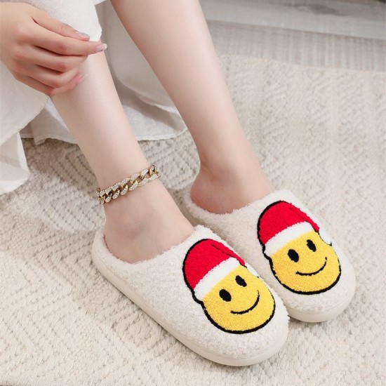 Comfortable and cute cartoon smiling Santa hat, Christmas tree, strawberry cotton slippers for couples, warm cotton slippers. Comfortable and cute cartoon smiling Santa hat, Christmas tree, strawberry cotton slippers for couples, warm cotton slippers.